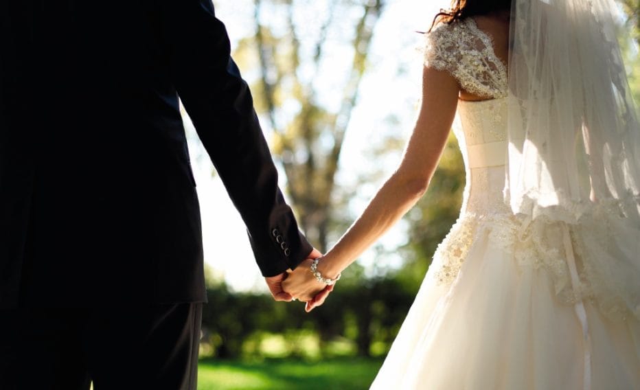 Weddings - couple holding hands