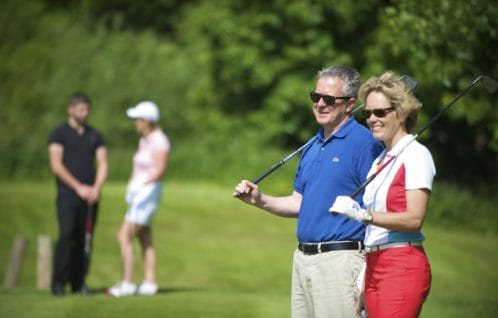Couple Golfing at Stoke by Nayland