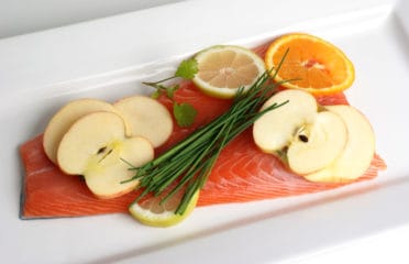 Fruit slices on salmon